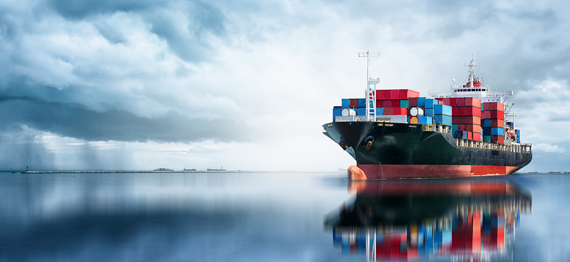 A boat carrying shipping containers. 