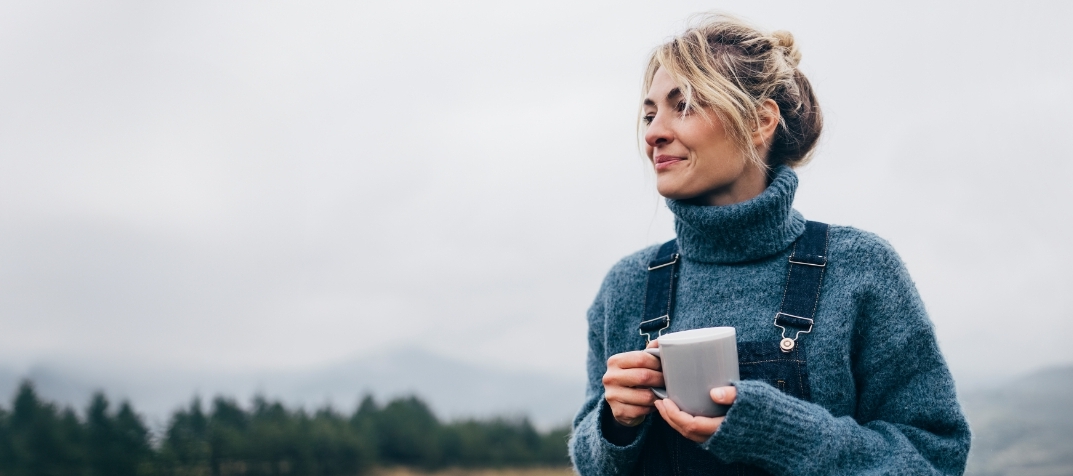 woman holding coffee